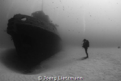 Having another view to a wreck. The Rozi is a tugboat in ... by Joerg Lietzmann 